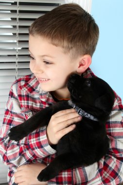 Boy and puppy clipart