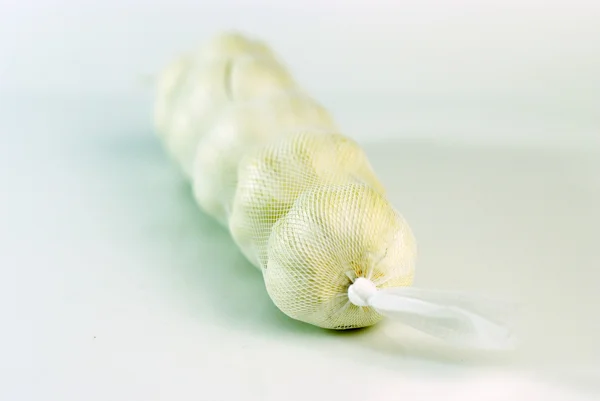 stock image Garlic cloves on a white background