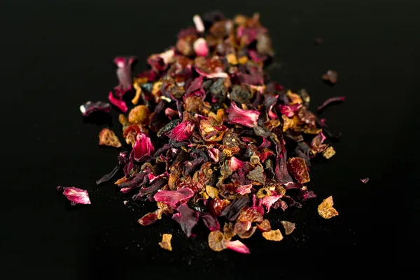 Dried hibiscus on the black — Stock Photo, Image