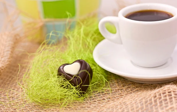 Coffee and chocolate candy. — Stock Photo, Image