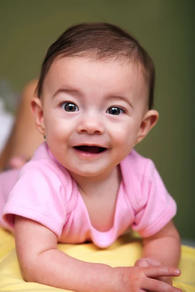 Beautiful baby girl on green background — Stock Photo, Image