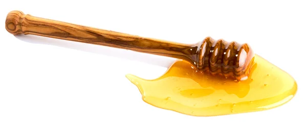 Honey dipper in honey — Stock Photo, Image