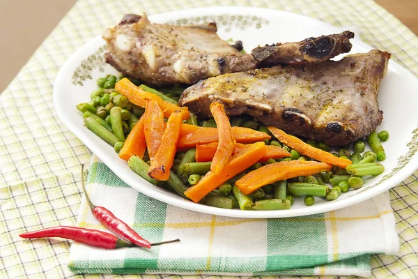 Pork ribs with carrot — Stock Photo, Image