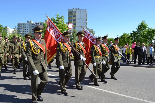 Victory Day. Festive demonstration.In a system soldiers. — Stock Photo, Image