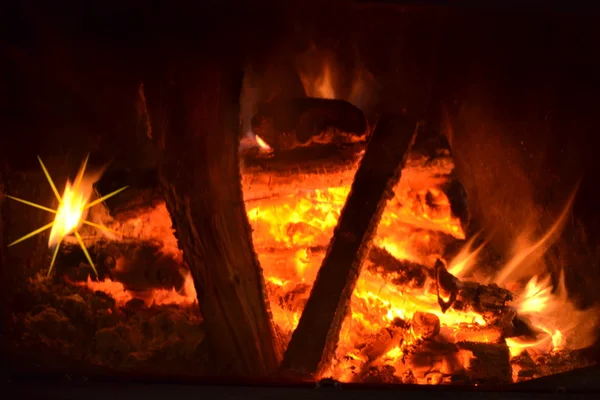 Fire in a fireplace. Stock Photo