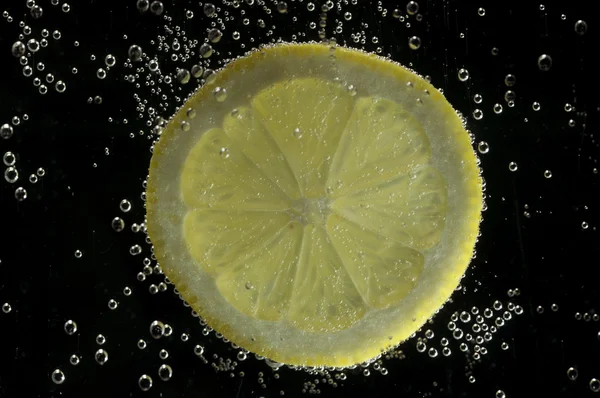 stock image Slice of lemon in Water 1