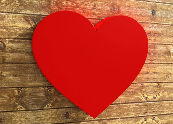 Σχήμα καρδιάς σε ξύλινο φόντο — Φωτογραφία Αρχείου