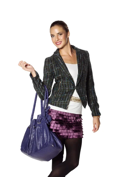 紫のスカートと緑のツイードのジャケットで美しい女性 — ストック写真