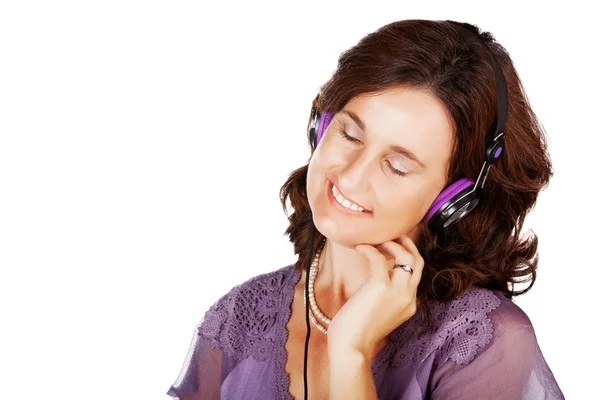 Woman in 30s with earphones — Stock Photo, Image