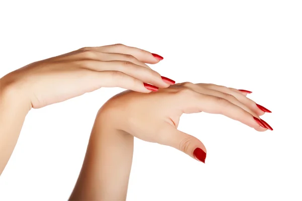 Woman hands with red nails — Stockfoto