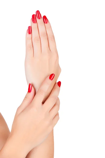 Mains de femme avec des ongles rouges — Photo