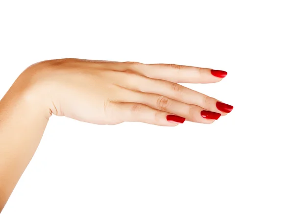 Žena ruku s červenými nehty manikúra — Stock fotografie