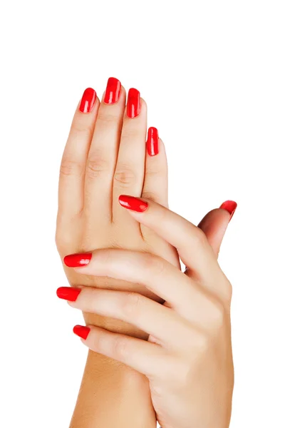 Mani donna con unghie rosse — Foto Stock