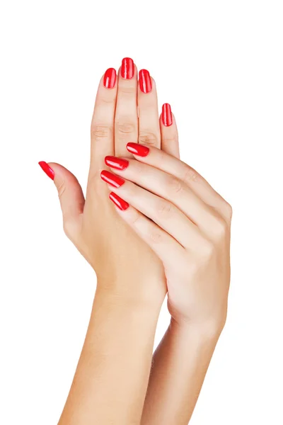 Mani donna con unghie rosse Foto Stock