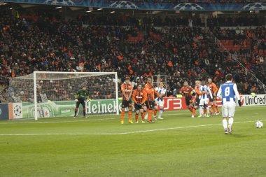 João Moutinho (No. 8, Porto) getting ready to punch kick