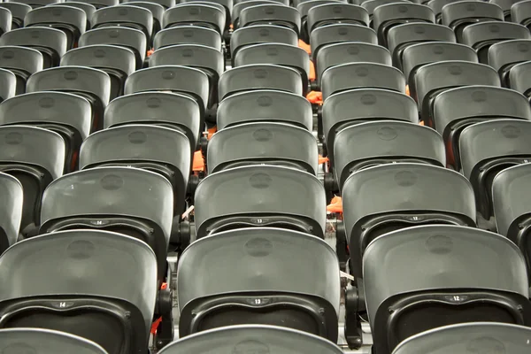 The empty black seats in the stadium — Stock Photo, Image