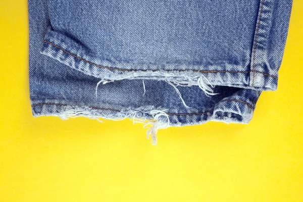 Frayed denim jeans — Stock Photo, Image
