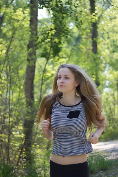 Attractive woman running — Stock Photo, Image