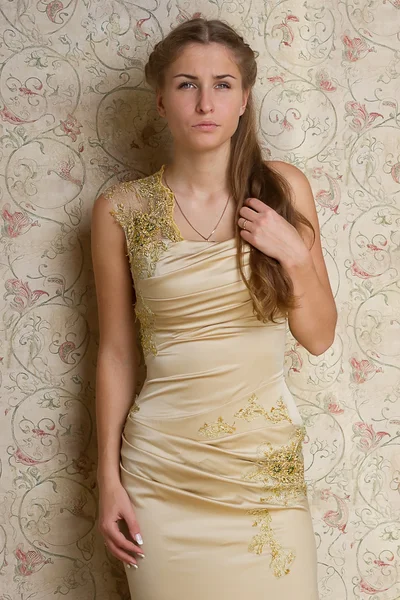 Beautiful sad girl in the dress — Stock Photo, Image