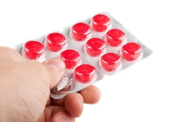 Tablettenpackung in der Hand — Stockfoto