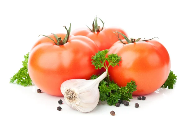Čerstvá červená rajčata a česnek — Stock fotografie