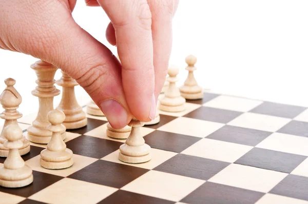 Человек играет в шахматы Лицензионные Стоковые Изображения