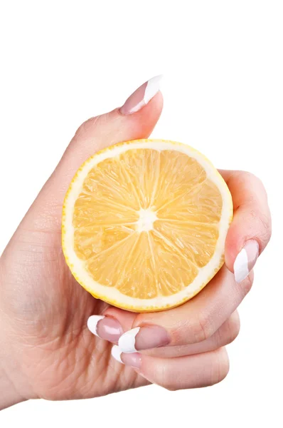 stock image Woman holding a lemon