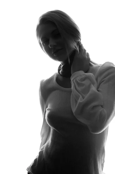 Silhouette eines Mädchens auf hellem Hintergrund — Stockfoto