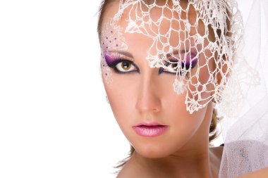 Pretty young girl professionally madeup in white veil clipart