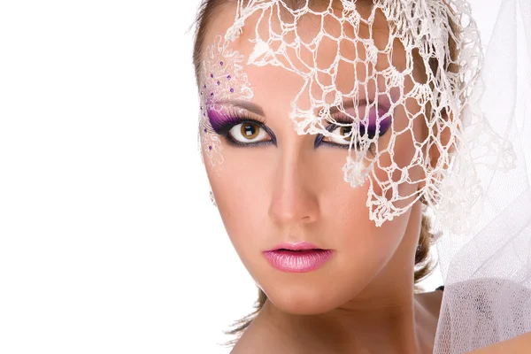 Pretty young girl professionally madeup in white veil — Stock Photo, Image