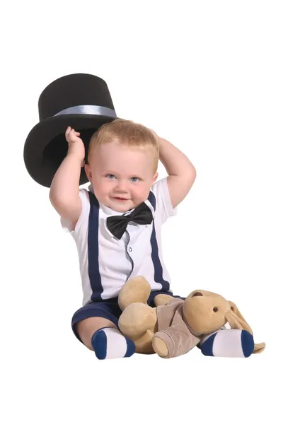 円柱帽子を握っている赤ちゃん男の子の手品師 — ストック写真
