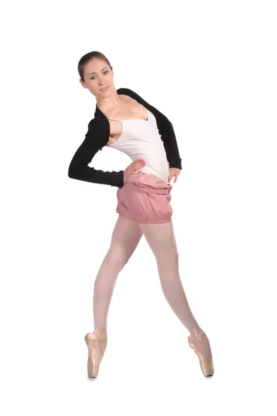Bailarina bailadora en punta de dedo del pie sobre fondo blanco — Foto de Stock