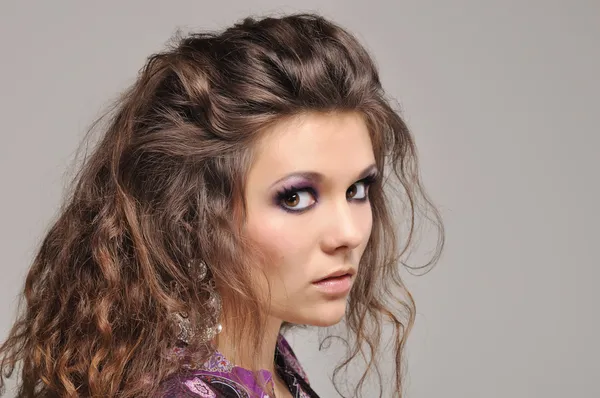 Young girl with curly hair — Stock Photo, Image