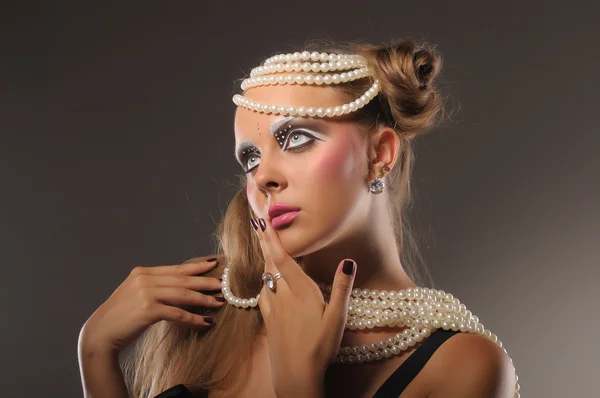 stock image Beautiful fair-haired girl with pearl beads