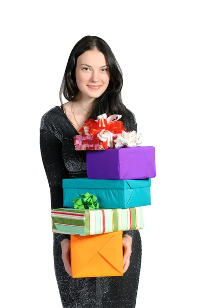 Chica bonita sosteniendo un montón de cajas con regalos — Foto de Stock