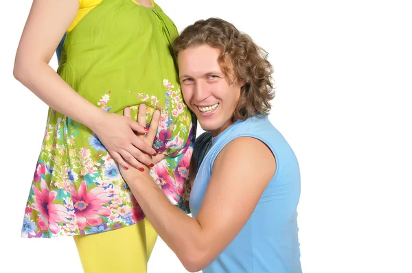 Mann umarmt schwangeren Bauch — Stockfoto