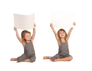 Twins sisters in rompers holding blank paper sheets isolated on clipart