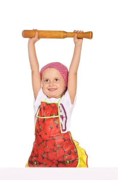 Little housewife in colourful apron playing with ram isolated on — Stock Photo, Image
