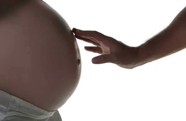 Homem abdômen entregue de mulher grávida — Fotografia de Stock
