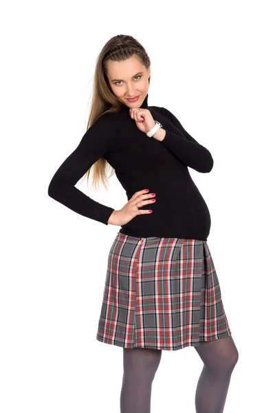 好怀孕的女孩在格子裙 1 — 图库照片