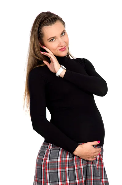 Милая беременная девушка в клетчатой юбке 7 — стоковое фото