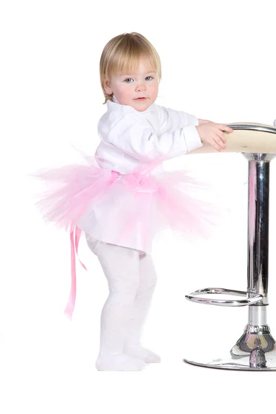 Little girl in a pink tutu standing — Stock Photo, Image