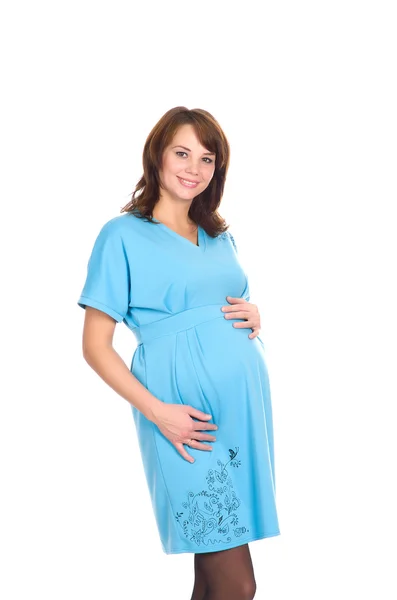 Mulher grávida, morena, de vestido azul — Fotografia de Stock
