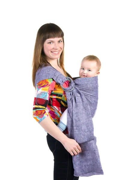 Young mother with baby in sling — Stock Photo, Image