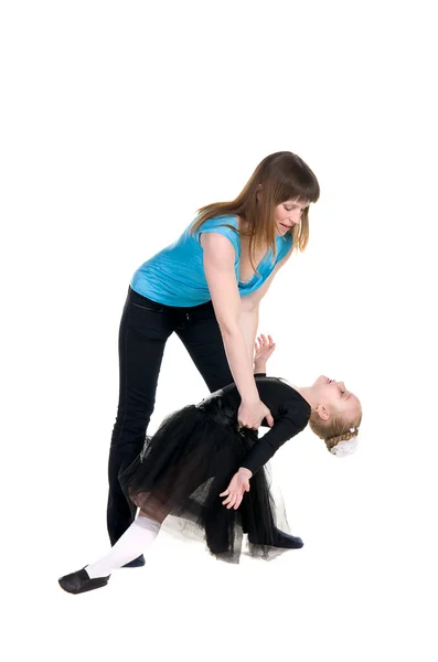 Treinador apoia a formação de um jovem dançarino — Fotografia de Stock