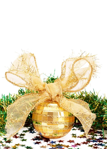 Gold Christmas bauble and tinsel — Stock Photo, Image
