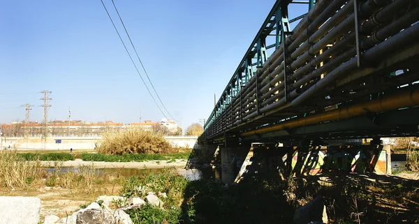 Railway bridge on the river Besós — стокове фото