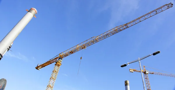 Cranes in a construction. — Stock Photo, Image