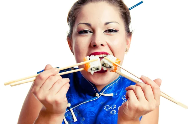 Girl eats two sushi immediately — Stock Photo, Image