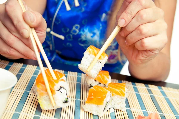 Sushi with salmon take two sticks — Stock Photo, Image